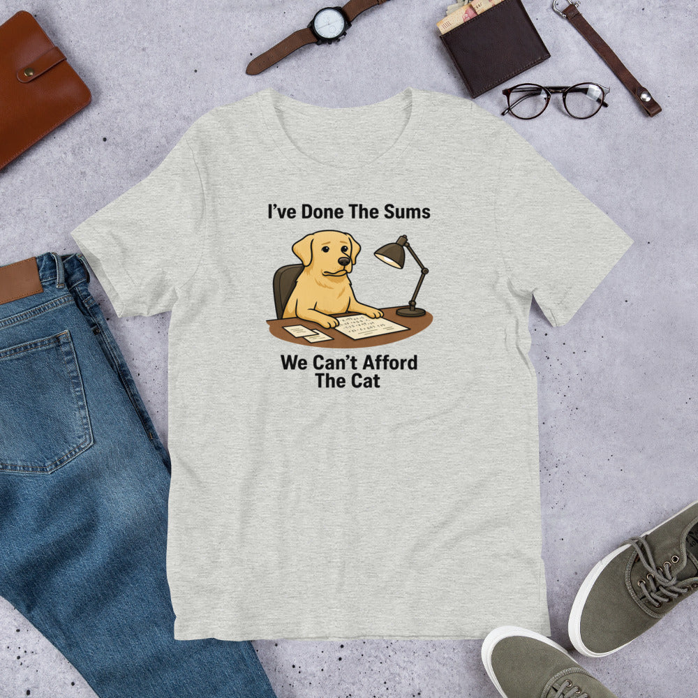 "I've Done The Sums" - Fun Labrador T-Shirt Gray t-shirt with a dog graphic and text on a concrete surface with jeans, shoes, and accessories.