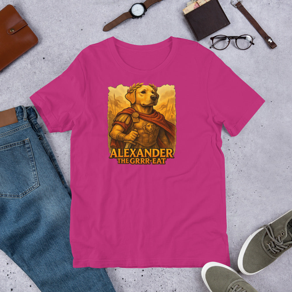 "Alexander The Grrr eat " – Fun Labrador T-Shirt Pink t-shirt with a graphic of a dog in armor and text 'Alexander The Grrr-Eat' on a gray surface with casual items.