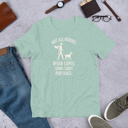 "Not All Heroes Wear Capes" - Fun Labrador T-Shirt Mint green t-shirt with a printed message on a gray surface with jeans, shoes, and accessories.