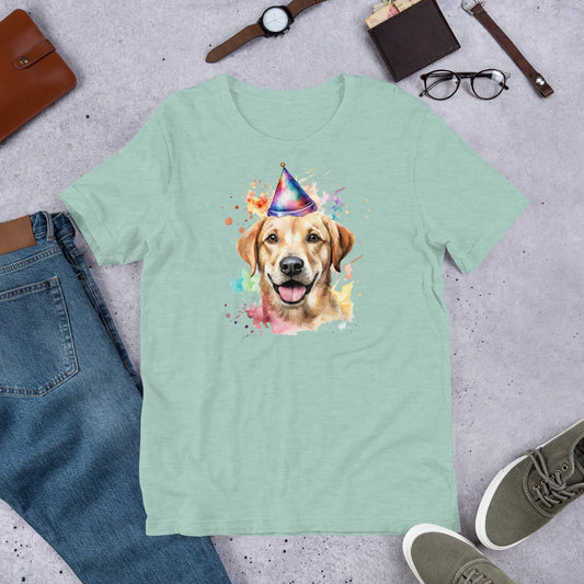 "Party Hat Lab " - Fun Labrador T-Shirt Mint green t-shirt with a dog wearing a party hat graphic, surrounded by jeans, shoes, and accessories on a gray surface.