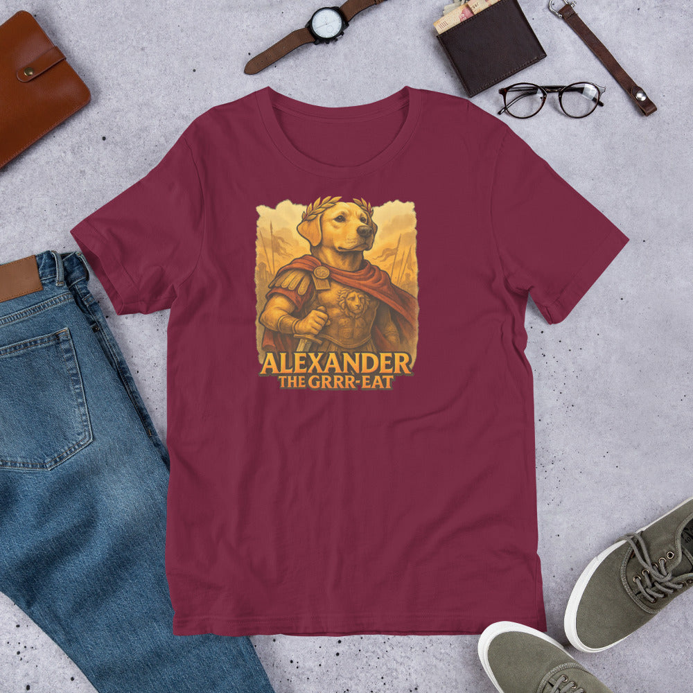 "Alexander The Grrr eat " – Fun Labrador T-Shirt Maroon t-shirt with 'Alexander the Grrr-reat' graphic on a concrete surface with casual items.