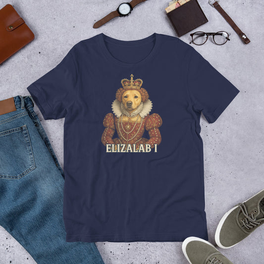 "Elizalab 1 " – Fun Labrador T-Shirt Navy blue t-shirt with a lion wearing a crown and 'ELIZALAB I' text, surrounded by jeans, shoes, and accessories on a concrete surface.
