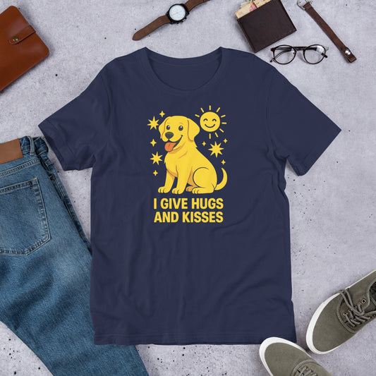 "I Give Hugs And Kisses " – Fun Labrador T-Shirt Navy blue t-shirt with a yellow dog graphic and text on a concrete surface with casual items.