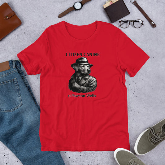 "Citizen Canine" - Fun Labrador T-Shirt Red t-shirt with 'Citizen Canine' graphic on a gray surface with jeans, shoes, and accessories.