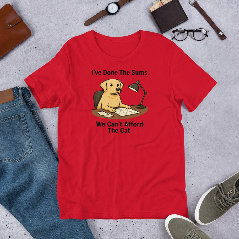 "I've Done The Sums" - Fun Labrador T-Shirt Red t-shirt with a dog graphic and text on a gray surface with jeans, shoes, and accessories.
