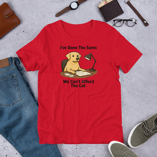 "I've Done The Sums" - Fun Labrador T-Shirt Red t-shirt with a dog graphic and text on a gray surface with jeans, shoes, and accessories.