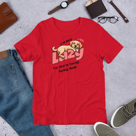 "I'm Not Lazy" - Fun Labrador T-Shirt Red t-shirt with a dog graphic and text on a gray surface with jeans, shoes, and accessories.