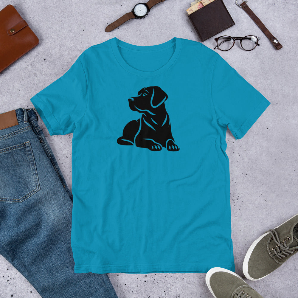 "Black Lab Lying Down " – Fun Labrador T-Shirt Blue t-shirt with a black dog graphic on a gray surface with jeans, shoes, and accessories.