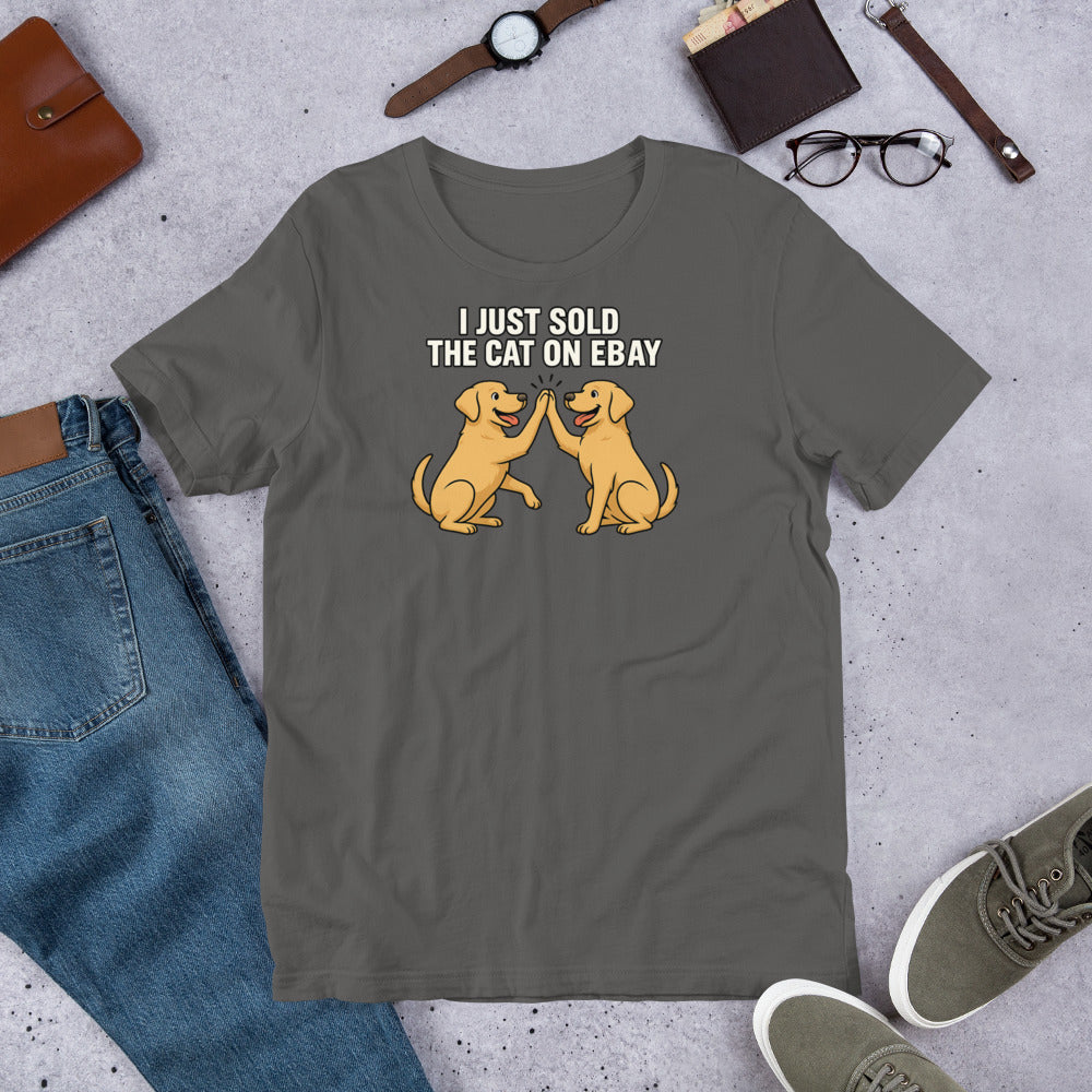 "I Just Sold The Cat On eBay" - Fun Labrador T-Shirt Gray t-shirt with dog graphic and text on a concrete surface with jeans, shoes, and accessories.