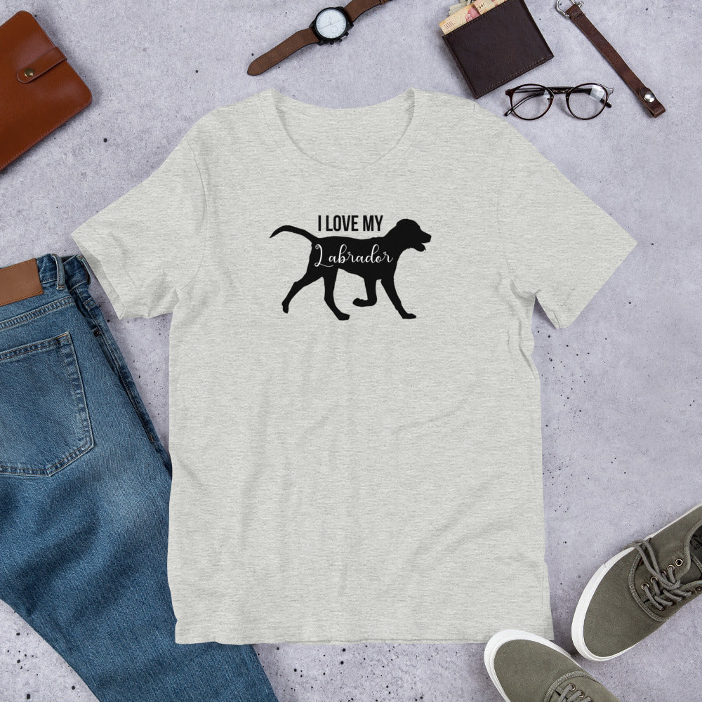 "I Love My Labrador " – Fun Labrador T-Shirt Gray t-shirt with 'I Love My Labrador' design on a concrete surface with jeans, shoes, and accessories.