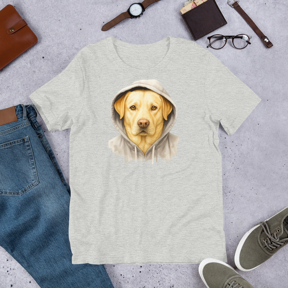 "Yellow Labrador In A Hoodie " – Fun Labrador T-Shirt Gray t-shirt with a dog wearing a hoodie graphic, surrounded by jeans, shoes, and accessories on a gray surface.