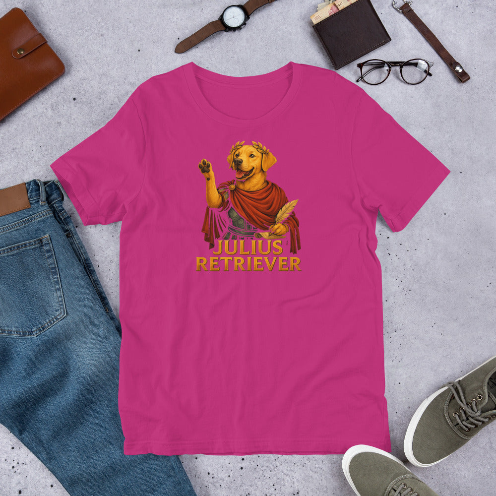 "Julius Retriever" - Funny Labrador T-Shirt Pink t-shirt with 'Julius Retriever' graphic on a gray surface with casual items.