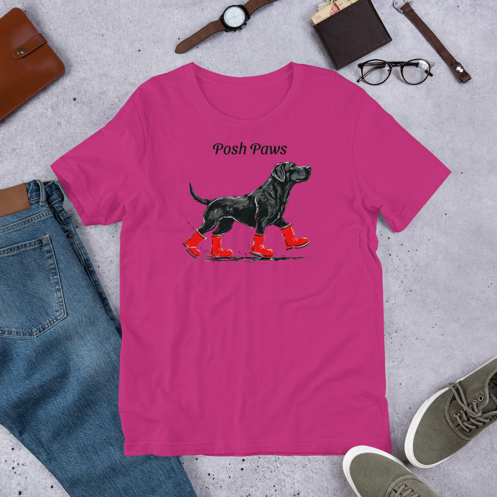 "Posh Paws" - Fun Labrador T-Shirt Pink t-shirt with a dog graphic and 'Posh Paws' text, surrounded by casual items on a concrete surface.
