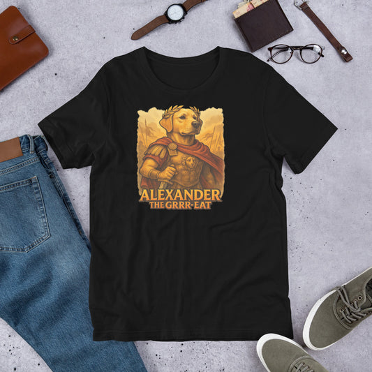 "Alexander The Grrr eat " – Fun Labrador T-Shirt Black t-shirt with a graphic of a dog in armor and 'Alexander The Grrr-reat' text, surrounded by jeans, shoes, and accessories on a concrete surface.