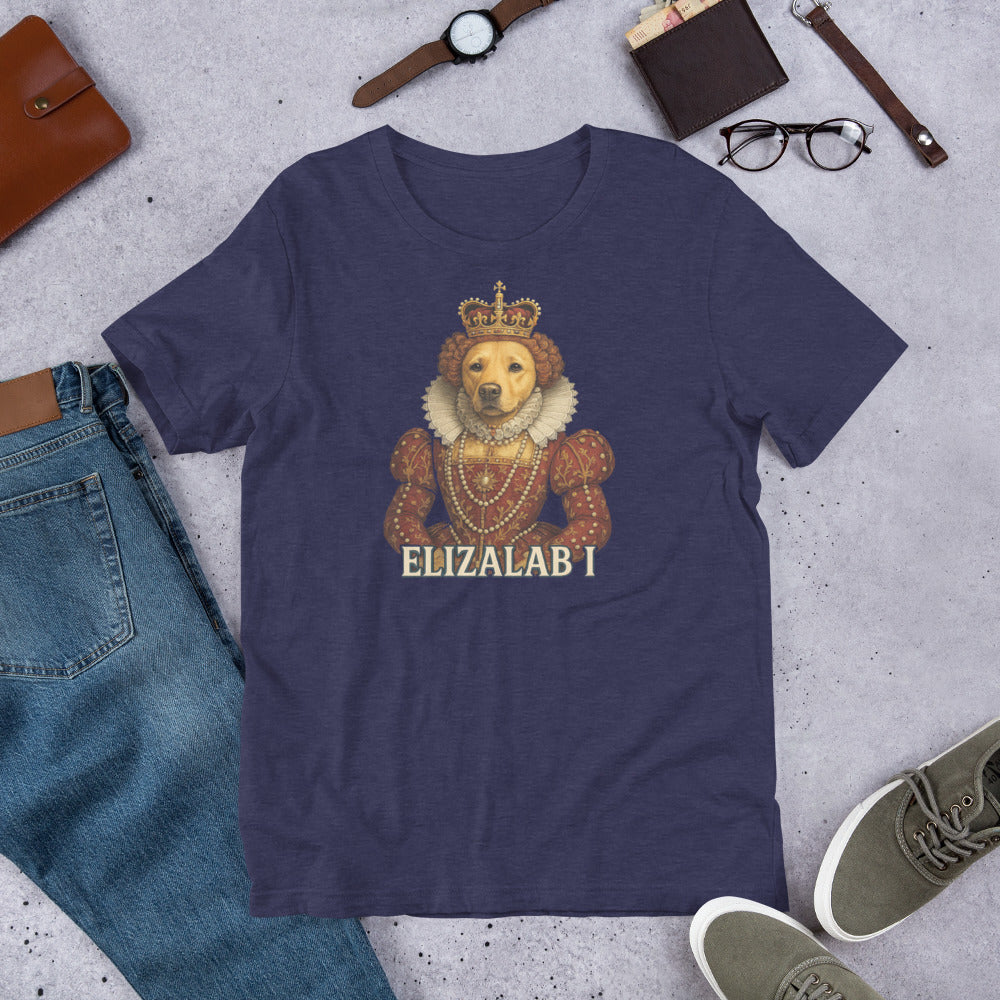 "Elizalab 1 " – Fun Labrador T-Shirt Navy blue t-shirt with a bear wearing a crown and jewelry graphic, surrounded by jeans, shoes, and accessories on a gray surface.
