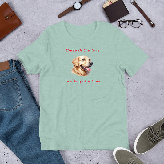 "Unleash The Love" - Funny Labrador T-Shirt Light green t-shirt with a dog graphic and text on a gray surface with jeans, shoes, and accessories.