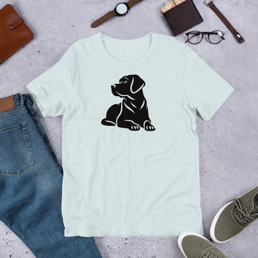 "Black Lab Lying Down " – Fun Labrador T-Shirt White t-shirt with black dog graphic on a gray surface with jeans, shoes, and accessories.