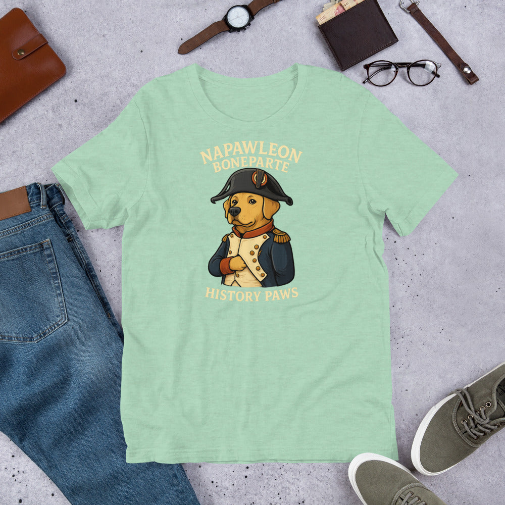 "Napawleon Boneparte" -Fun Labrador T-Shirt  Green t-shirt with a bear graphic and text on a gray surface with jeans, shoes, and accessories.