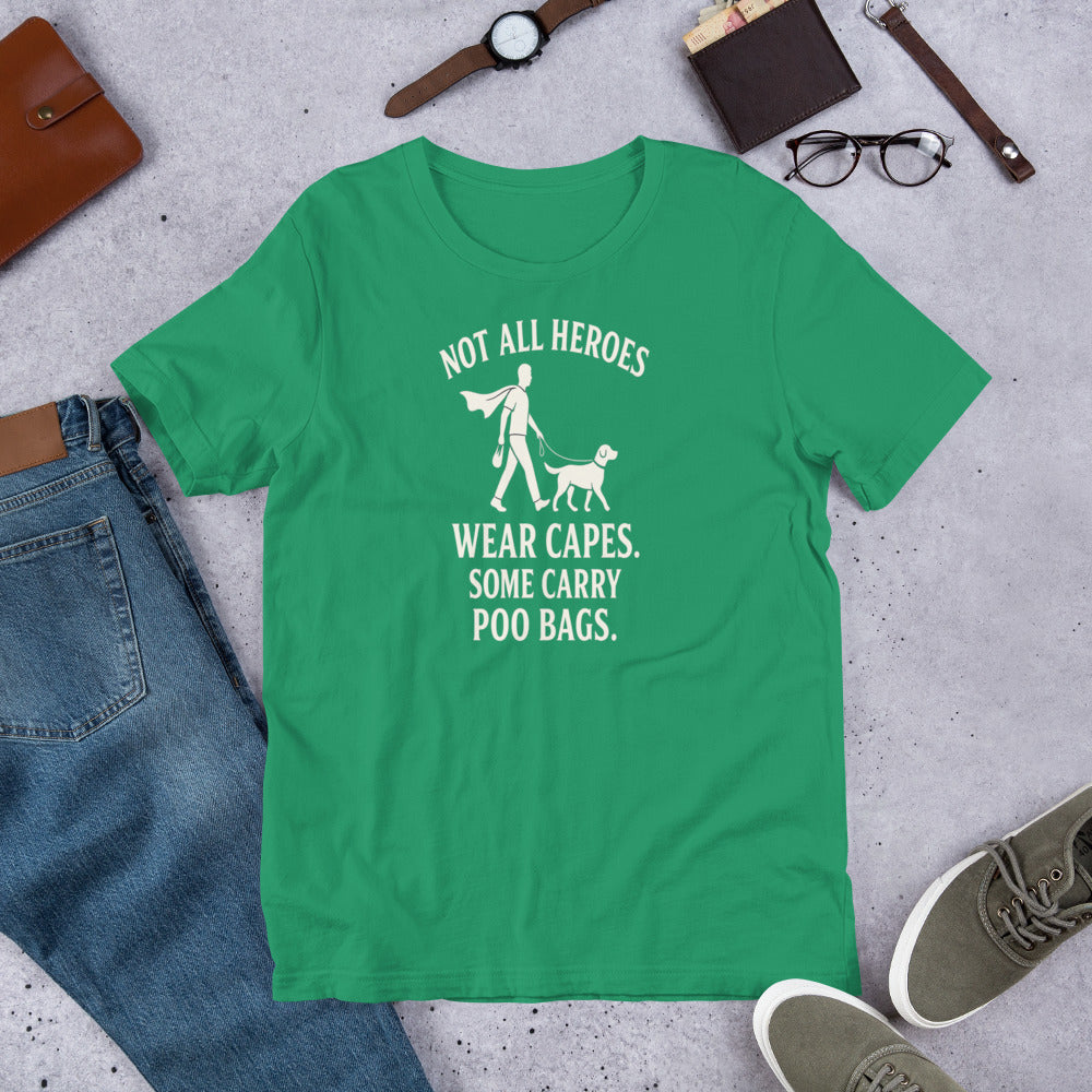 "Not All Heroes Wear Capes" - Fun Labrador T-Shirt Green t-shirt with a humorous print on a concrete surface with casual items.