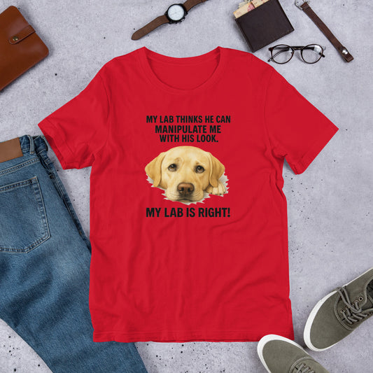 "My Dog Thinks" - Yellow Lab - Fun Labrador T-Shirt Red t-shirt with a Labrador graphic and text on a concrete surface with casual items.