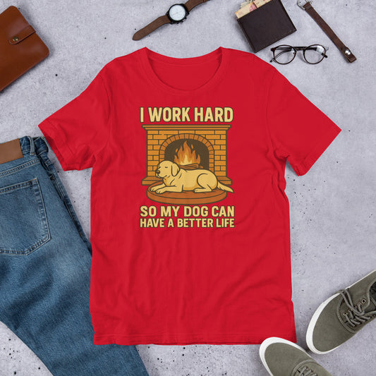 "I Work Hard So My Dog Can Have A Better Life " - Fun Labrador T-Shirt Red t-shirt with a graphic and text on a gray surface with casual items around