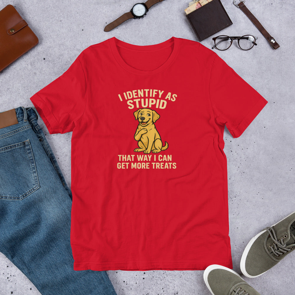 "I Identify As Stupid " – Fun Labrador T-Shirt Red t-shirt with a dog graphic and text on a gray surface with casual items around