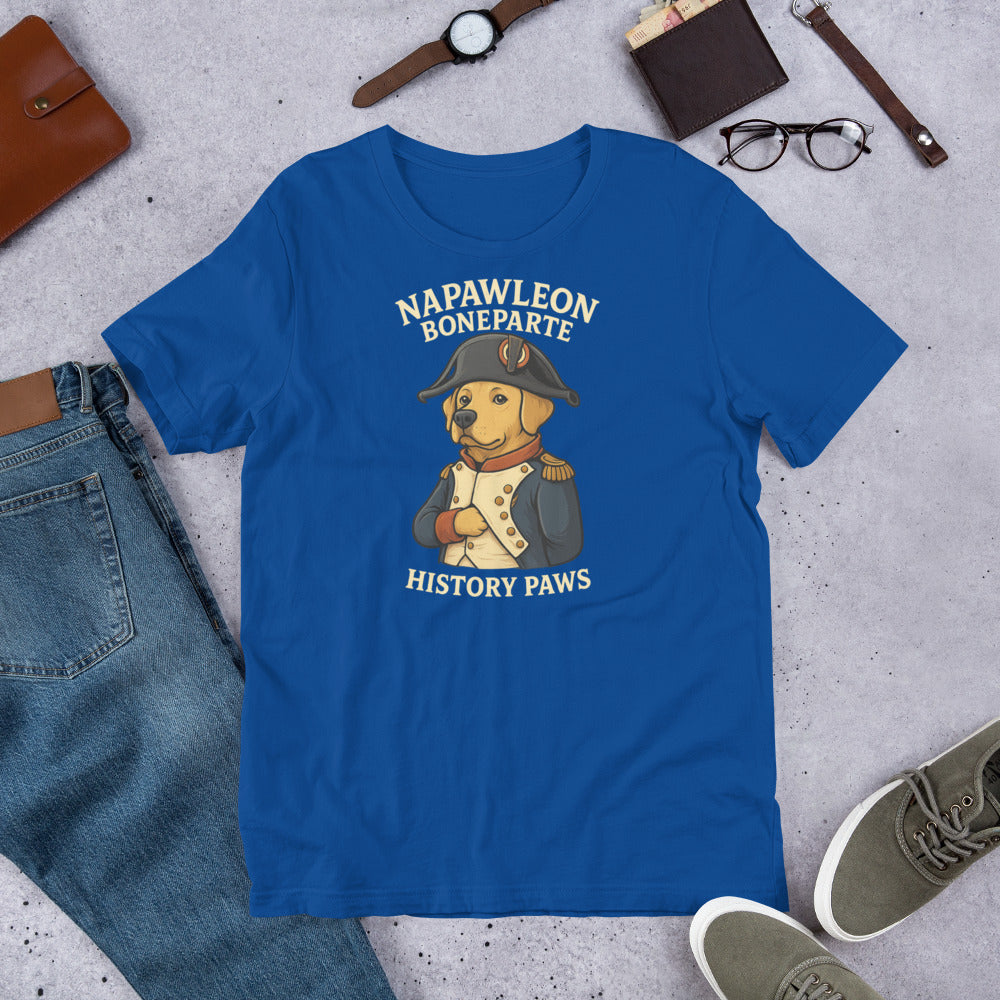 "Napawleon Boneparte" -Fun Labrador T-Shirt Blue t-shirt with a bear in a historical outfit and text on a gray surface with jeans, shoes, and accessories.