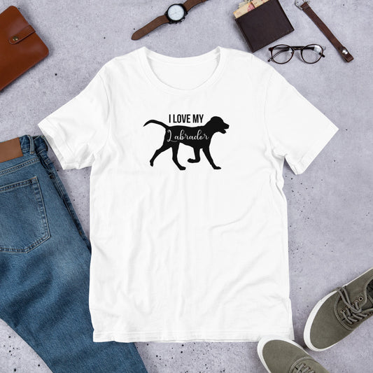 "I Love My Labrador " – Fun Labrador T-Shirt White t-shirt with 'I Love My Labrador' design on a gray surface with jeans, shoes, and accessories.