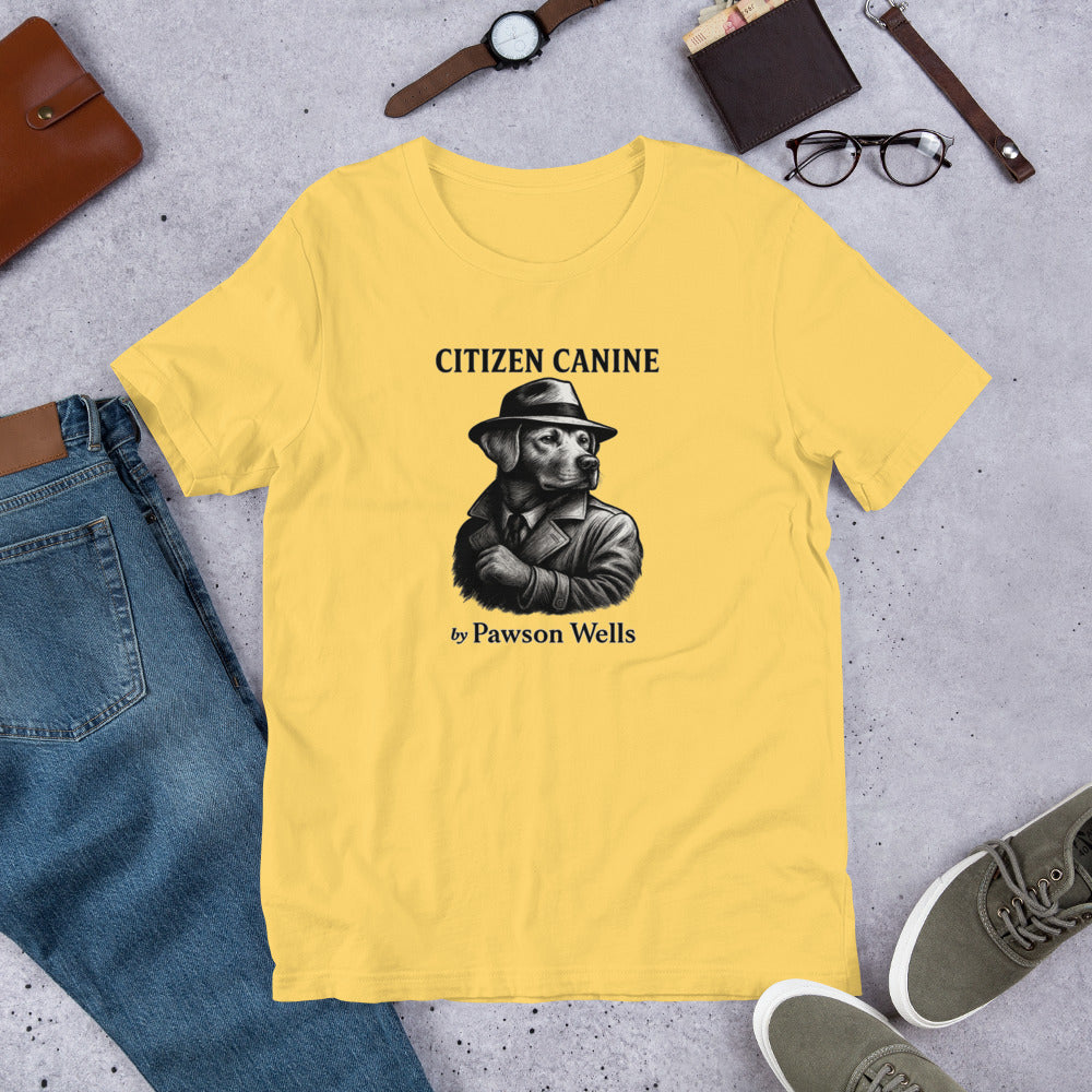 "Citizen Canine" - Fun Labrador T-Shirt Yellow t-shirt with 'Citizen Canine' graphic and text on a concrete surface with casual items.